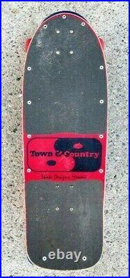 Vintage, 1980s era, Town & Country skateboard full of color and graphics