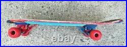 Vintage, 1980s era, Town & Country skateboard full of color and graphics