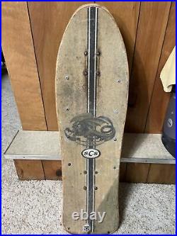 Vintage Santa Cruz skateboard deck with original wheels and trucks Good Shape